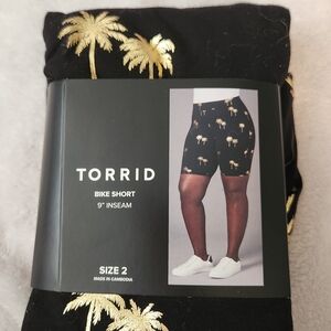 torrid Black Bike Shorts with Gold Palm Motif